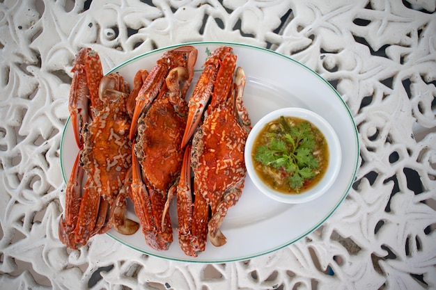 Crabe de fleurs cuit avec sauce thaïlandaise aux fruits de mer.