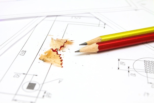 Photo crayon et plans d'un dessin d'architectes