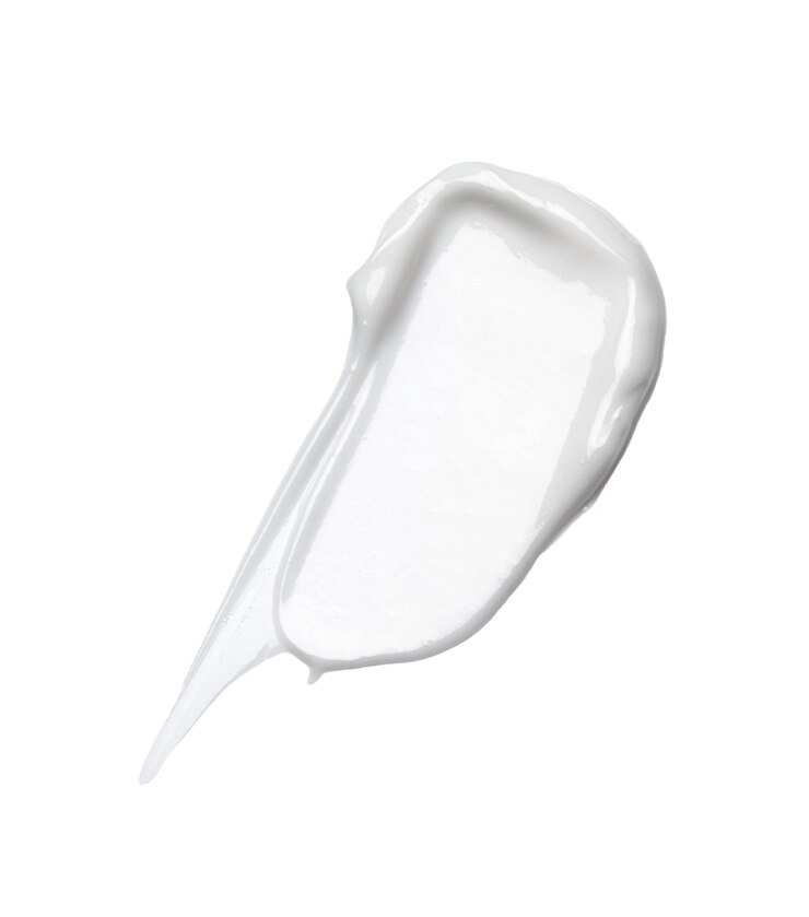 Photo crème cosmétique blanche sur blanc