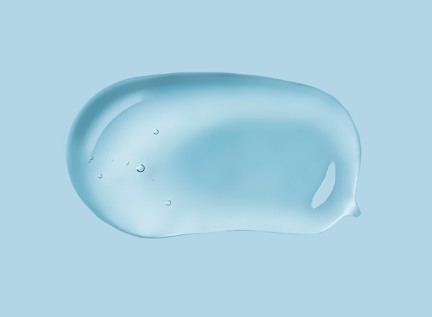 Crème liquide gel mousse gommage masque cosmétique maculage texture menthe fond bleu