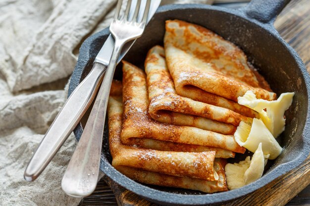 Crêpes au beurre saupoudré de sucre en poudre