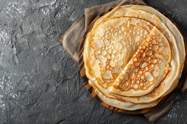 Des crêpes minces ou des blini russes sur un fond gris IA générative