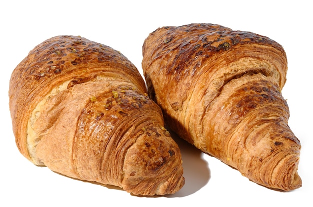 Croissant cuit au four sur une vue de dessus de fond isolé blanc