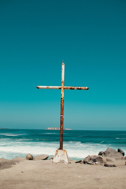 Photo une croix sur la plage