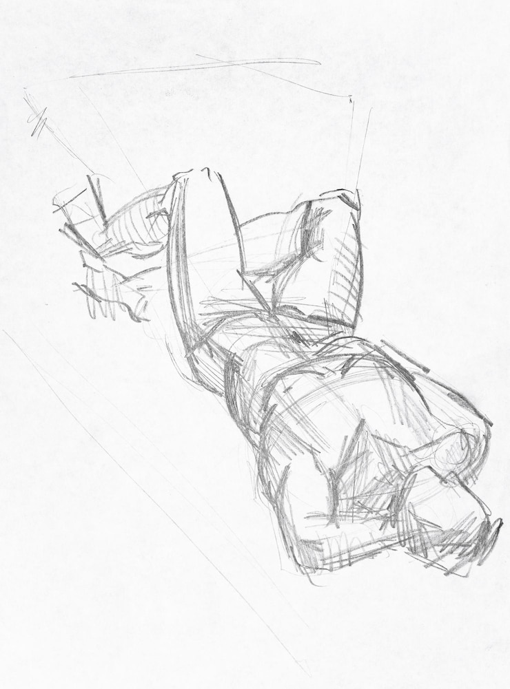 Photo croquis dessiné à la main d'un modèle masculin allongé sur le dos