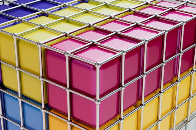 cube multicolore dans une cage en fer.