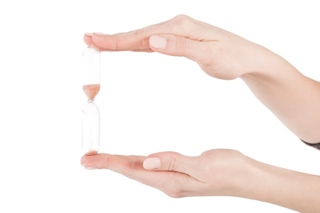 Photo cueillir les mains avec du verre de sable