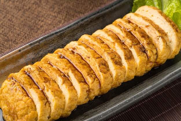 Cuisine de rue de spécialité japonaise Tamagoyaki