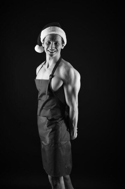 Cuisinier Sexy Homme Musclé Porter Un Chapeau De Père Noël Bodybuilder Sur Fond Noir Vacances D 