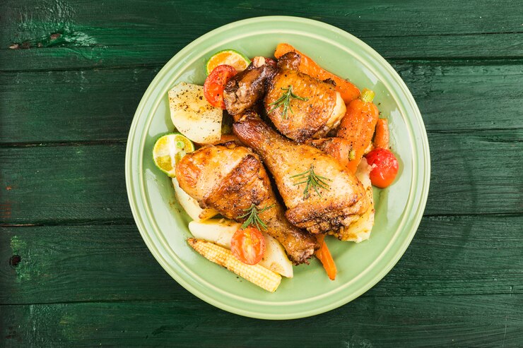 Photo cuisse de poulet rôti sur une plaque