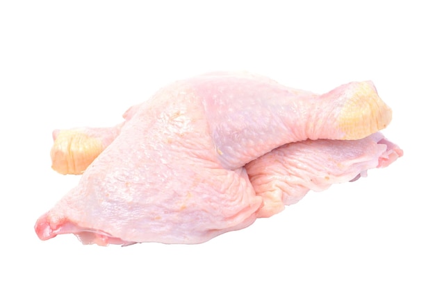 Cuisses de poulet sur fond blanc isolé