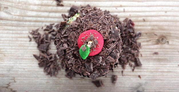 Photo cupcake avec pomme de sucre sucré sur une image supérieure d'un