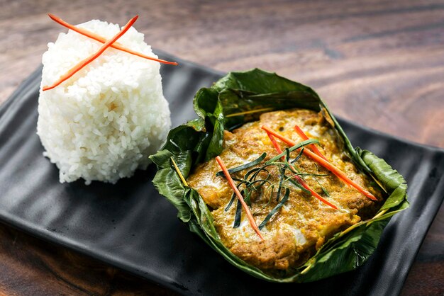 Photo le curry de poisson amok traditionnel cambodgien khmer