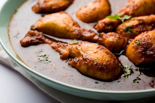 Photo curry de poulet avec cuisses ou pilon ou murg tangri ou tangdi masala