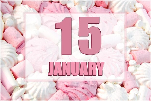 Date du calendrier sur fond de guimauves blanches et roses Le 15 janvier est le quinzième jour du mois