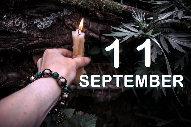 Date du calendrier sur le fond d'un rituel spirituel ésotérique Le 11 septembre est le onzième jour du mois