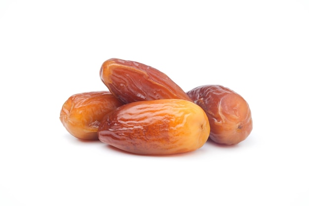 Dates fruits isolés sur fond blancFruits du Moyen-Orientfruits sains