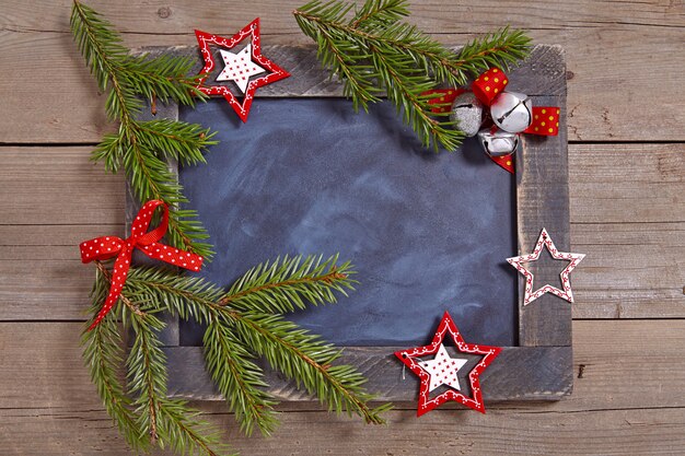 Décoration de Noël avec tableau rustique et étoiles