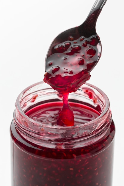 Photo délicieuse confiture en pot transparent