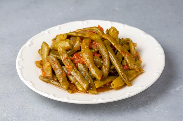 Délicieuse cuisine traditionnelle turque Haricots verts à l'huile d'olive Nom turc Zeytinyagli taze fasulye ou zeytinyagli yesil fasulye