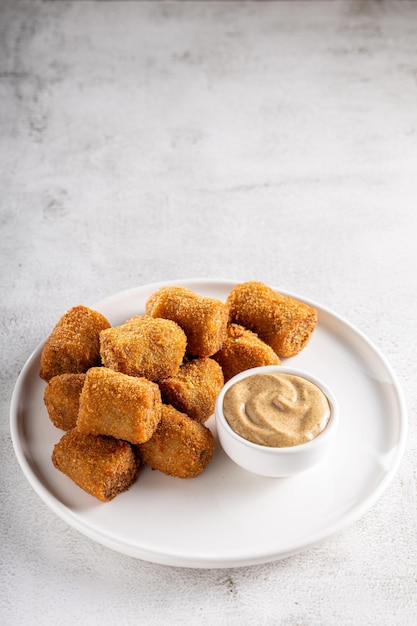 Photo délicieuses croquettes de viande frite croquette traditionnelle