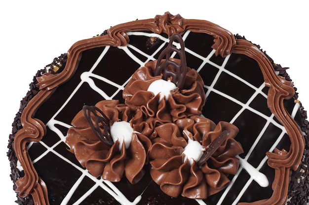Photo délicieux gâteau au chocolat isolé sur fond blanc libre