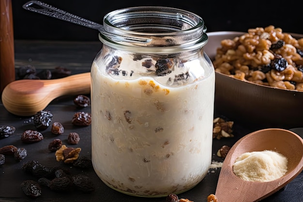 Démarreur au levain dans un bocal avec des raisins secs et des noix pour plus de saveur créé avec une IA générative