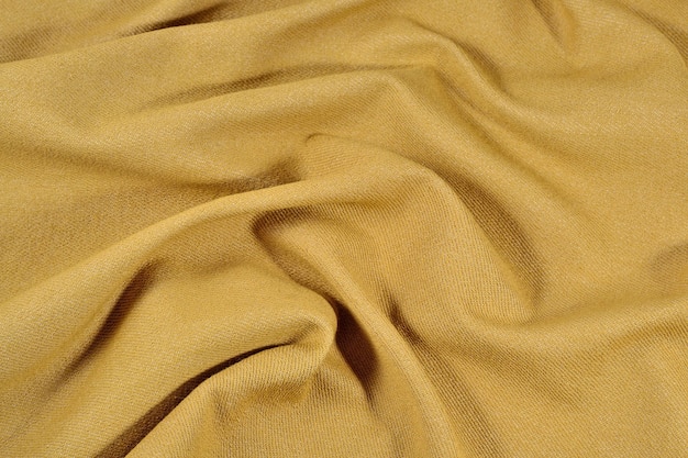 Denim froissé jaune comme texture de fond