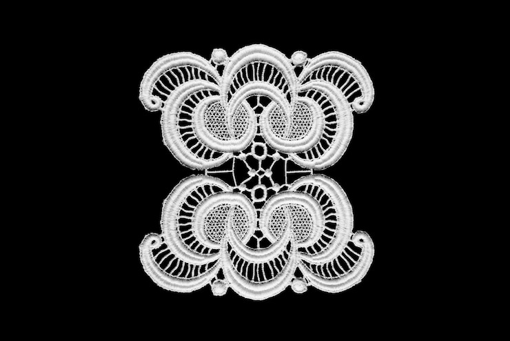 Photo de la dentelle blanche isolée