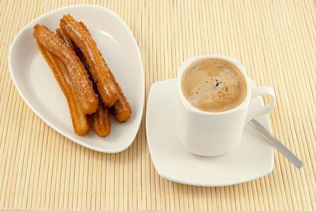 Desayuno tipico en Espana churros con cafe con leche