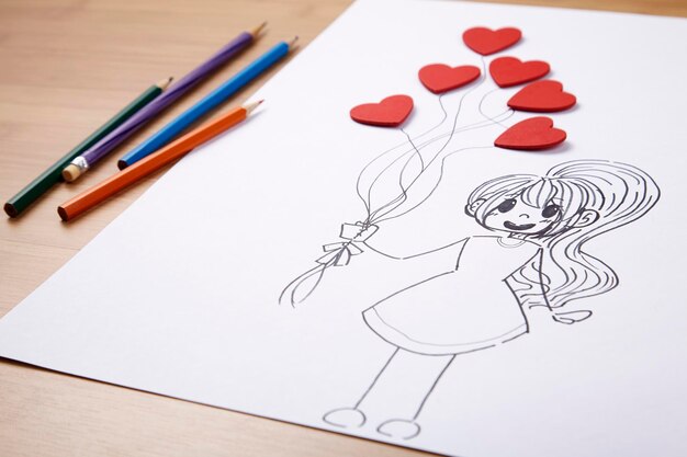 Photo dessin d'une femme tenant des ballons en forme de cœur rouge sur du papier blanc