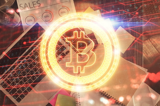Dessins d'hologrammes sur le thème de la blockchain sur ordinateur sur fond d'écran Vue de dessus Double exposition