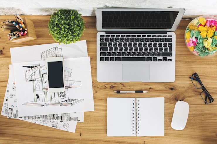 Photo dessus de bureau avec gadgets vides et croquis