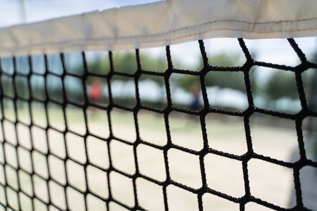 Détail du filet d'un court de tennis