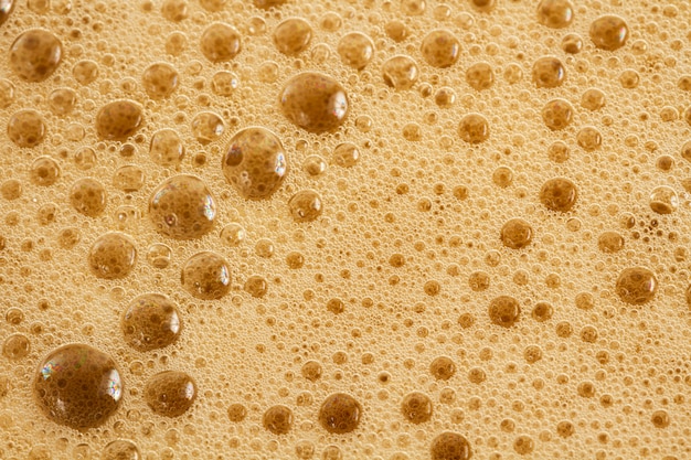 Détail macro de bulle de soda et de mousse