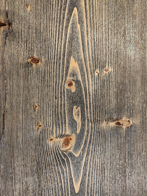 Détail de la texture du bois foncé, image prise avec un objectif macro