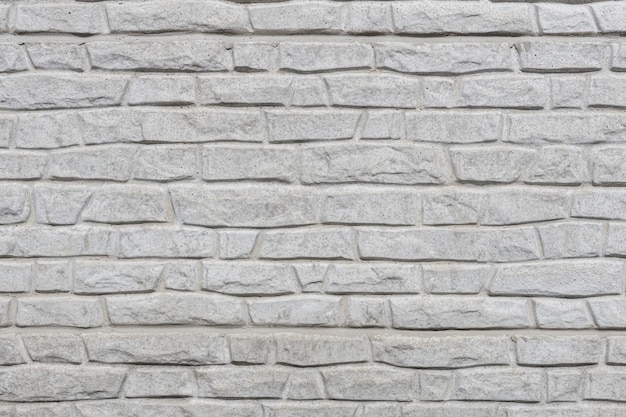 Détail de la texture du mur de briques blanches. Concept de fond de texture rustique fond de mur de briques blanches