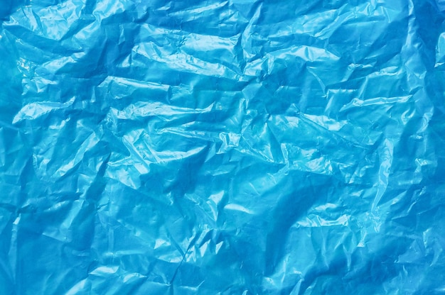 détail de la texture du sac en plastique bleu