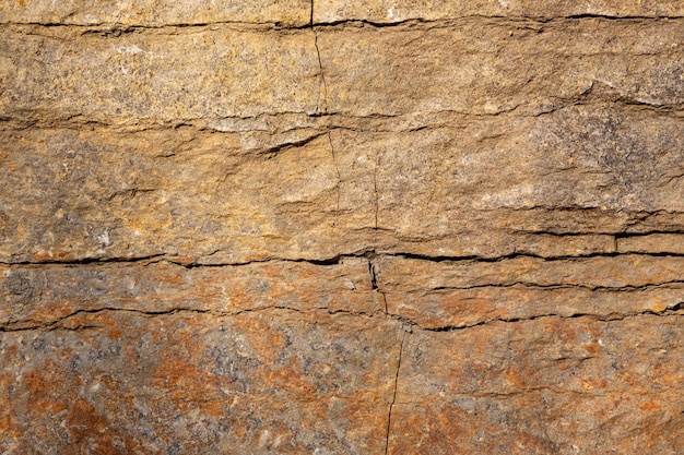 Détail de la texture de la pierre gros plan de la surface rocheuse pour le fond et la conception