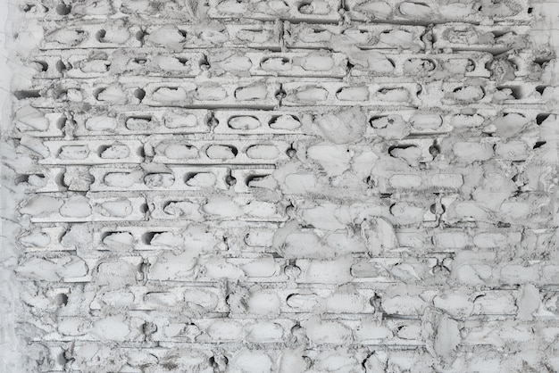 détails architecturaux inachevés mur de brique de béton gris sous construction