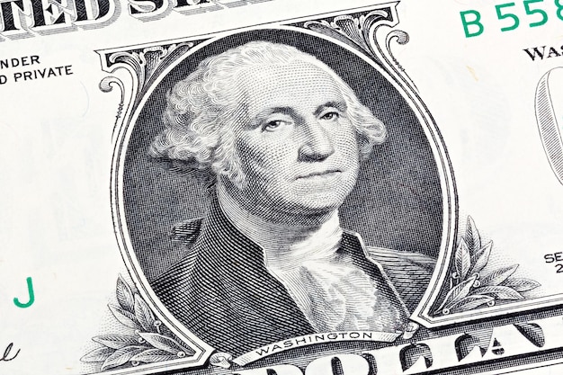 Détails d'un billet d'un dollar George Washington en premier plan