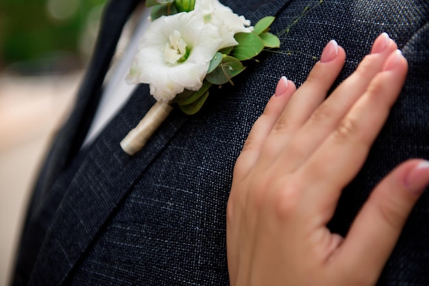 Détails du mariage des câlins des mariés