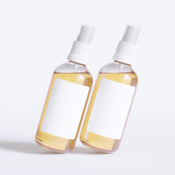Photo deux bouteilles de liquide avec une étiquette blanche qui dit " dispensateur "