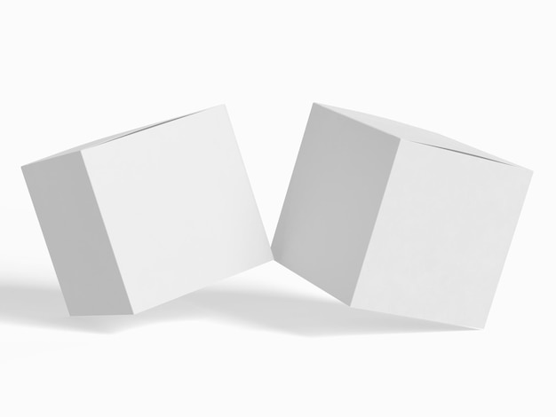 deux cubes blancs sont placés sur un fond blanc