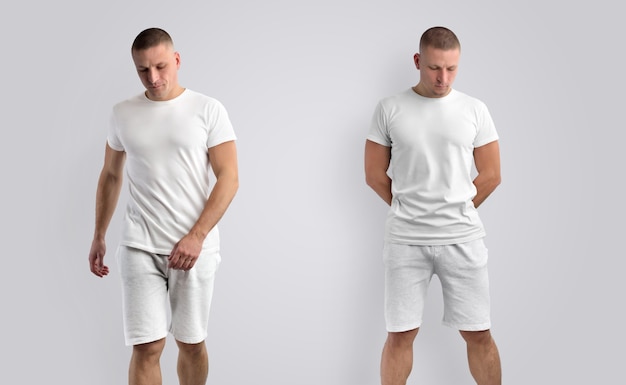 Deux maquettes de vêtements de présentation de conception. Modèle masculin athlétique dans un T-shirt vierge et un short isolé sur un fond. Vue de face.