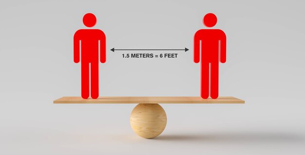 Deux personnes debout en équilibre sur une balance en bois pour une distance sociale entre les deux. Concept de rester physiquement à l'écart pour le contrôle des infections destiné à arrêter ou à ralentir la propagation du conoravirus COVID-19