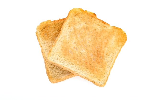 Deux slicec de pain grillé isolé sur fond blanc en gros plan de détails élevés