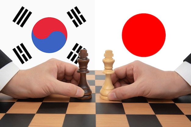 Différend Commercial Entre La Corée Du Sud Et Le Japon Exprimé Dans Un Jeu D'échecs.