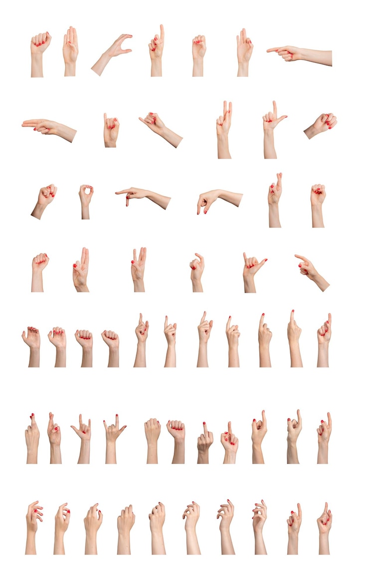 Photo différents gestes de la main, des signes de doigts isolés sur un fond blanc, des bras féminins avec un vernis rouge.