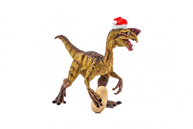 Dinosaure Oviraptor avec chapeau de Noël blanc